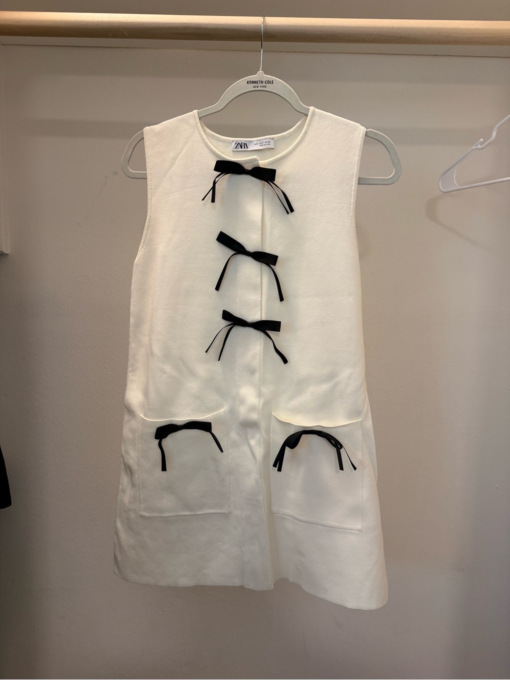 Zara Ivory Sleeveless A-Line Dress with Black Bow Accents